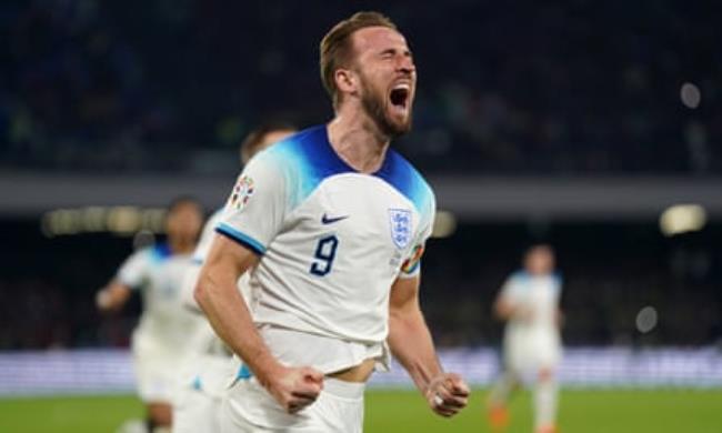 Harry Kane celebrates scoring the penalty that made him England's all-time record goalscorer, against Italy in Naples in 2023.