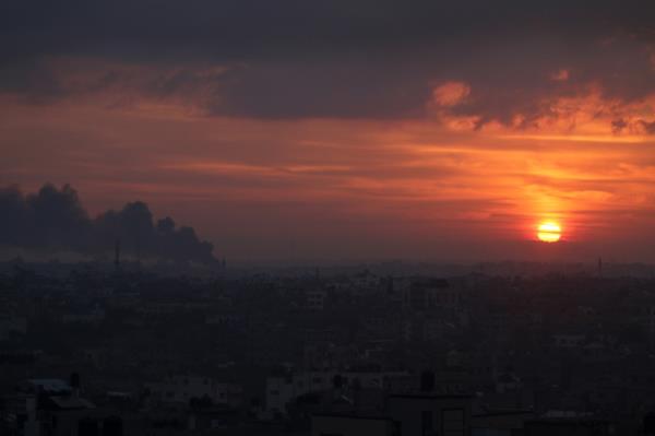 Smoke is seen billowing from the sky following air raids in Gaza.