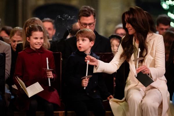 Kate Middleton with Princess Charlotte and Prince Louis at "Together at Christmas" in 2023