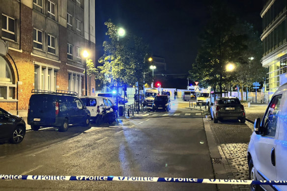 Police cordon off an area where a shooting took place in the centre of Brussels. 