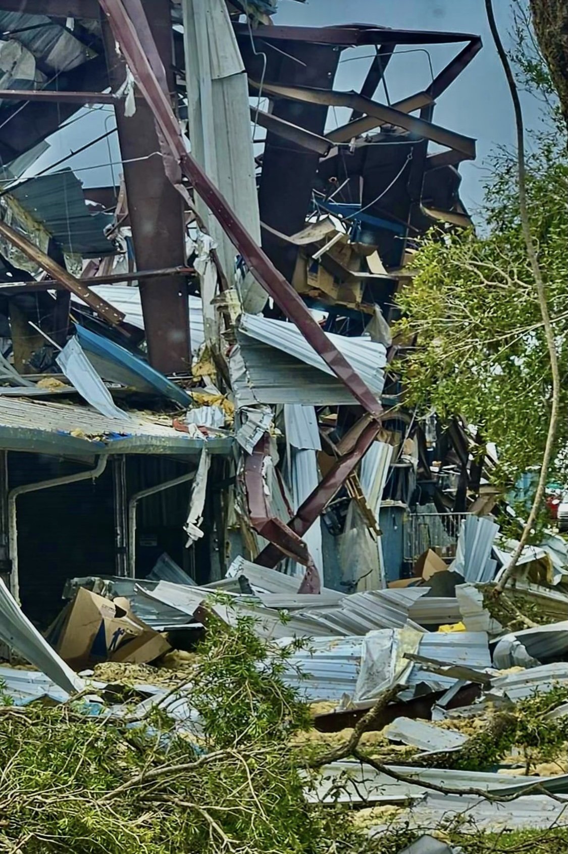 A building torn apart by Hurricane Milton in South Florida