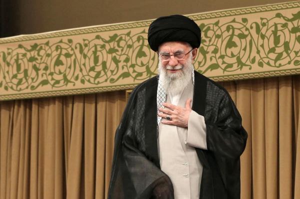 Iran's Supreme Leader Ayatollah Ali Khamenei in a turban and robe, greeting an audience during a speech in Tehran on September 25, 2024.