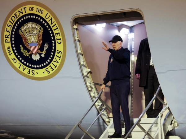 President Joe Biden gestures as he deboards Air Force One, at Dover Air Force base in Dover, Delaware, U.S., July 17, 2024.