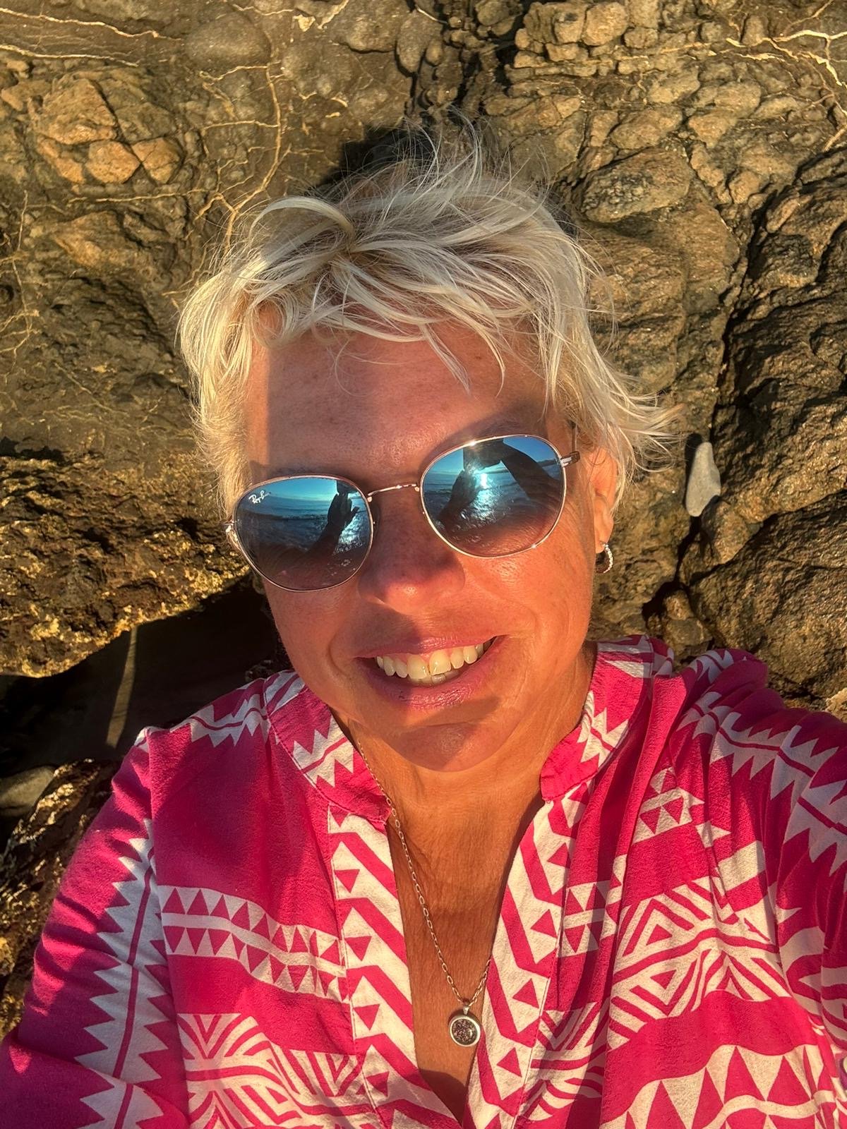 Karie in the sunshine wearing sunglasses