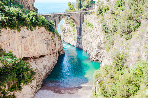 Famous fiordo di furore beach seen from bridge.
