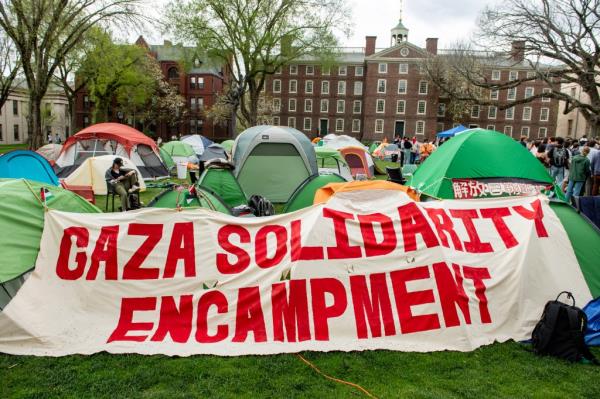 Students and community members hold a pro-Palestine rally at the encampment at Brown University in Providence, Rhode Island on April 29, 2024.
