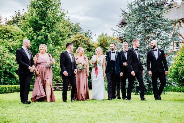 Tessa Hegarty and Adam Doyle with their wedding party. 