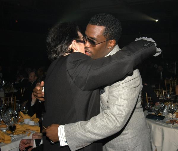 Bono and Diddy hug at the 45th Grammy Awards in 2003