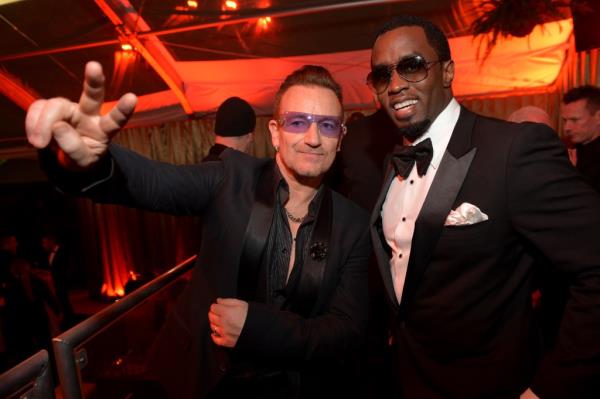Bono and Diddy pose for a photo after the 2014 Golden Globes