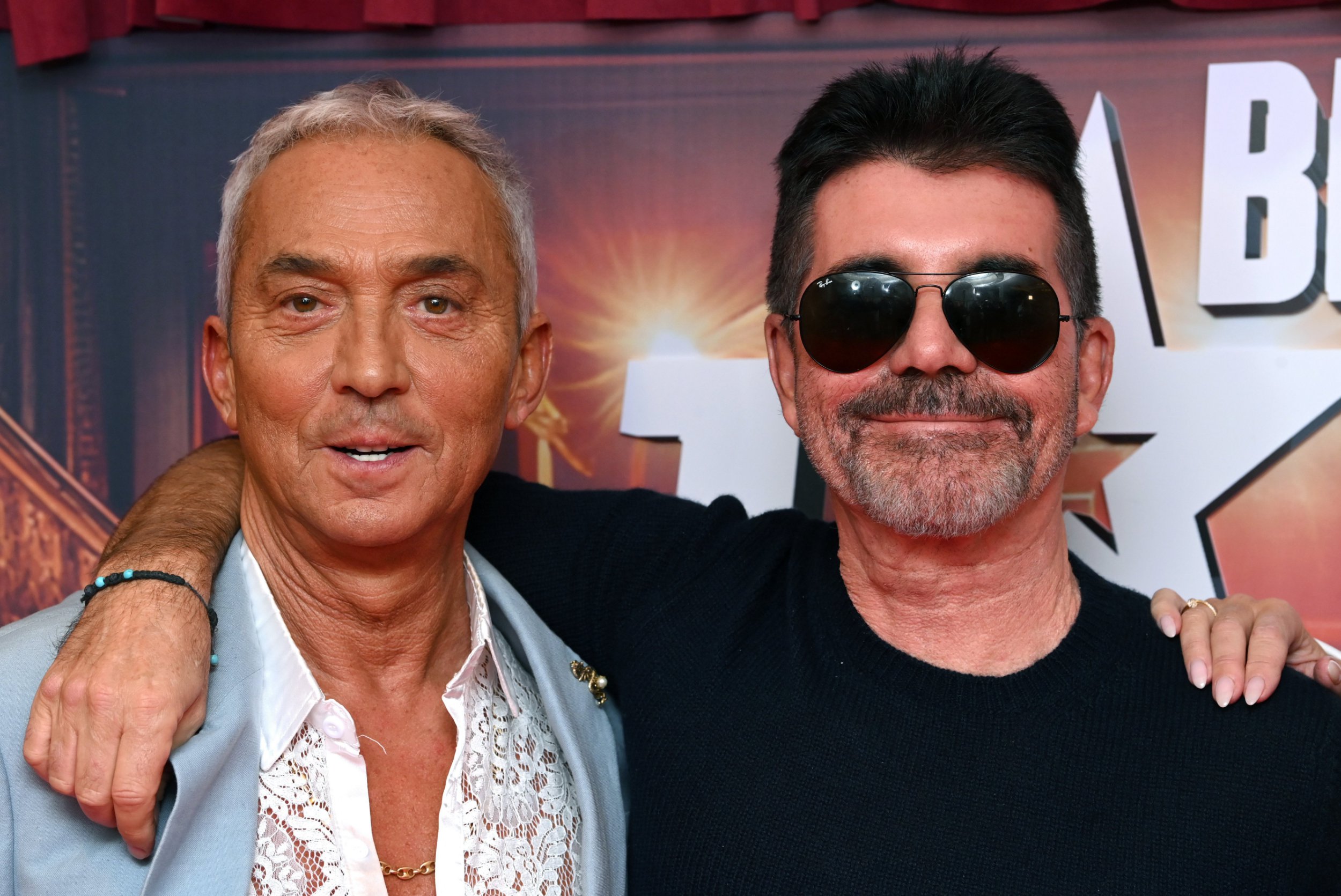  Bruno Tonioli and Simon Cowell posing together at the Britain's Got Talent TV Show photocall