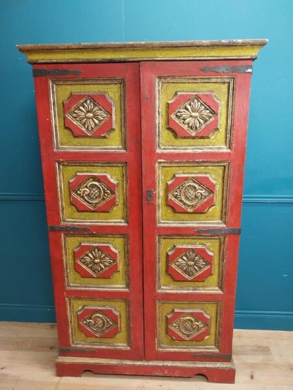 A 19th-century painted pine cupboard. A 19th-century painted pine cupboard.