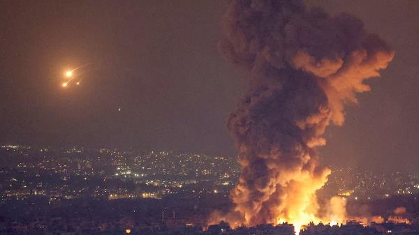 Smoke and flames rise in Beirut's southern suburbs after Israeli airstrikes as seen from Sin El Fil, Lebanon, October 6, 2024.