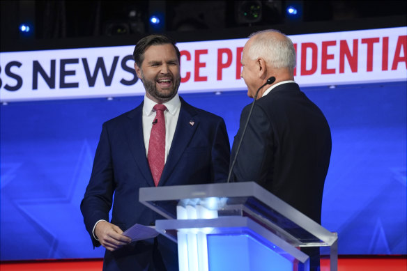 Civil: the Republican VP nominee J. D. Vance with his Democratic rival, Tim Walz, after the vice-presidential debate hosted by CBS News.