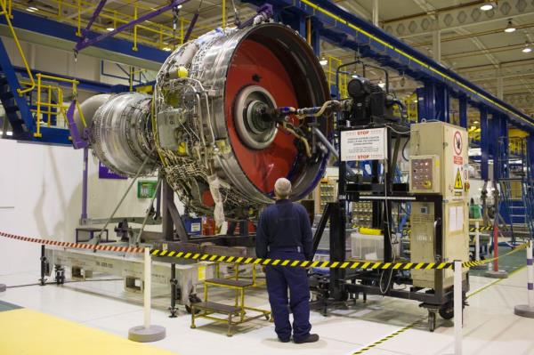 GREAT BRITAIN - APRIL 18: Enginer works on a Rolls Royce jet engine in the production factory, Derbyshire, United Kingdom (Photo by Tim Graham/Getty Images)