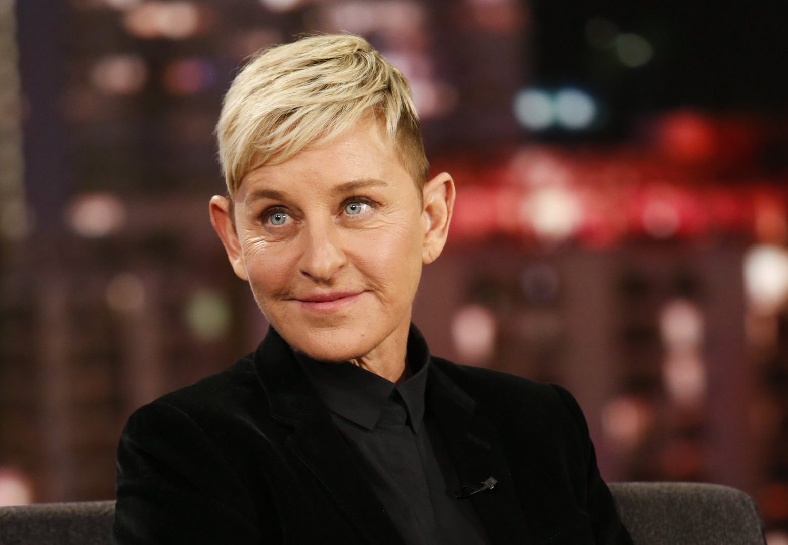 Ellen DeGeneres wearing a black shirt and jacket on Jimmy Kimmel Live