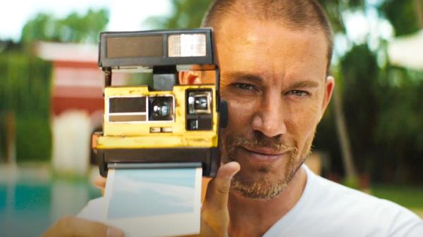 Channing Tatum in Blink Twice holding a camera