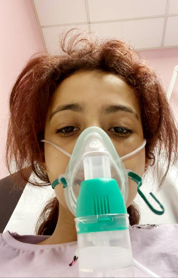 Sarah on the nebulizer
