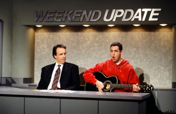 Kevin Nealon and Adam Sandler during the 'Weekend Update' skit on February 13, 1983.