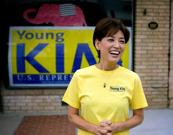Young Kim, a candidate who is running for a U.S. House seat in the 39th District in California, smiles outside her campaign office in Yorba Linda, California on Oct. 6, 2018.