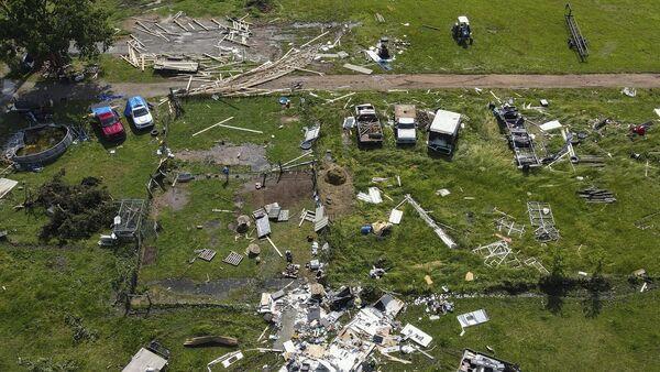 22 dead as powerful storms leave trail of destruction across several US states