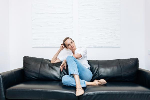 Beri Smither sitting on a couch