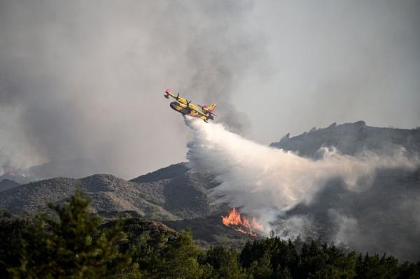Three people die in Greece as wildfires rage