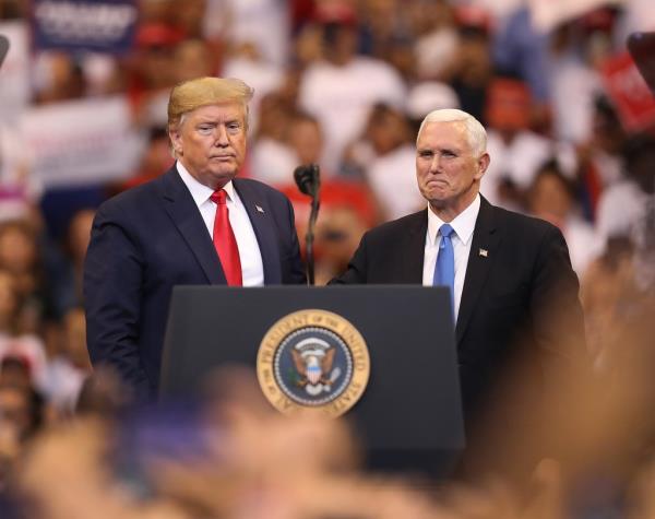 Trump is pictured with Pence in 2019.