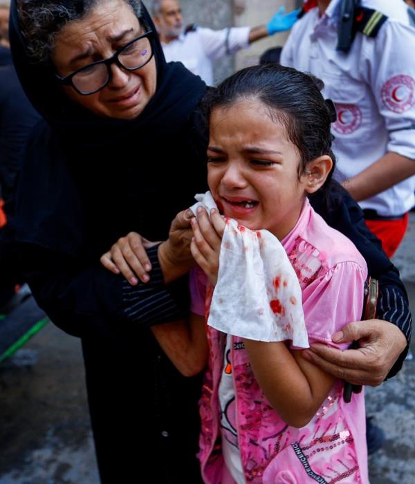 A photo of a Palestinian girl crying.