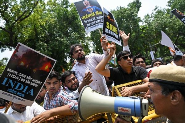 Indian police arrest four over video of two women paraded naked, may face death penalty