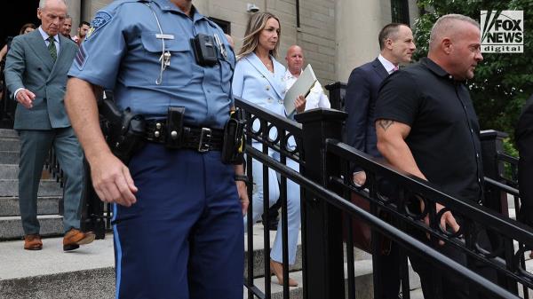 A photo of Karen Read and John O'Keefe is presented as evidence.