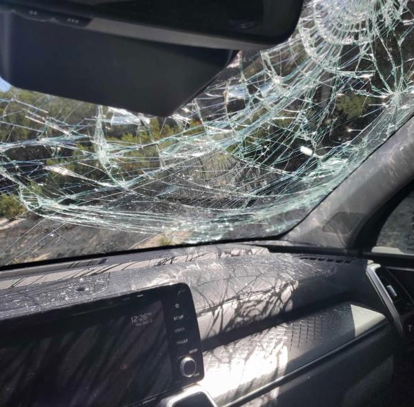 smashed windshield from inside car