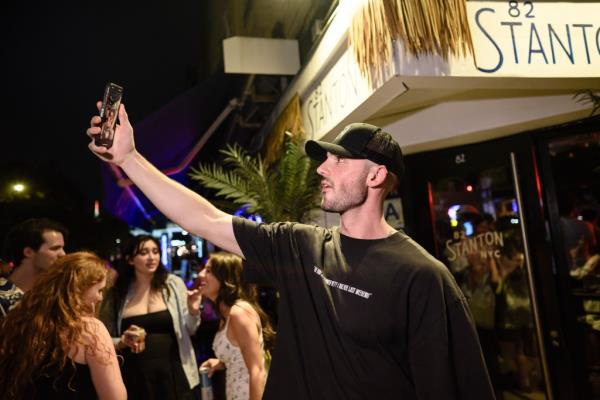 Luke Timm recording a TikTok video
