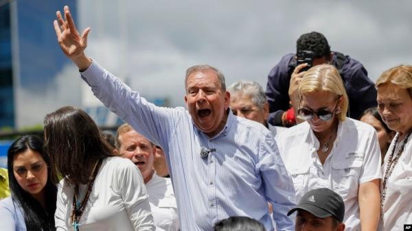 FILE - Opposition presidential candidate Edmundo Gonzalez leads a demonstration against the official election results that declared that President Nicolas Maduro won reelection in Caracas, Venezuela, July 30, 2024.