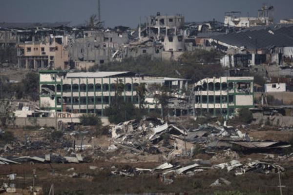 Destroyed farms and buildings in the Gaza Strip as seen from Southern Israel. Picture: Leo Correa/AP