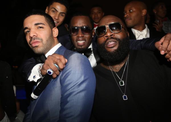 L-R) Drake, Sean 'Diddy' Combs' and Rick Ross attend Sean 'Diddy' Combs' Ciroc The New Years Eve Party at his home on December 31, 2013 in Miami Beach, Florida. 