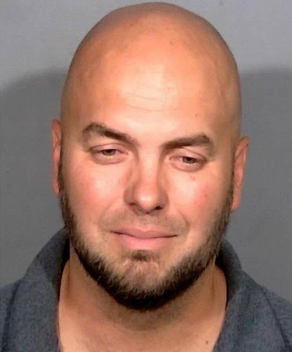 Iurie Trofim, 40, is accused of crashing his Ram 1500 pickup truck into the Marine veteran.