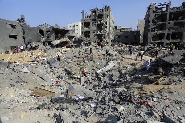 Palestinians wander among debris of buildings that were targeted by Israeli airstrikes in Jabaliya refugee camp, northern Gaza Strip on Wednesday. (Picture: AP Photo/Abed Khaled) Palestinians wander among debris of buildings that were targeted by Israeli airstrikes in Jabaliya refugee camp, northern Gaza Strip on Wednesday. (Picture: AP Photo/Abed Khaled)
