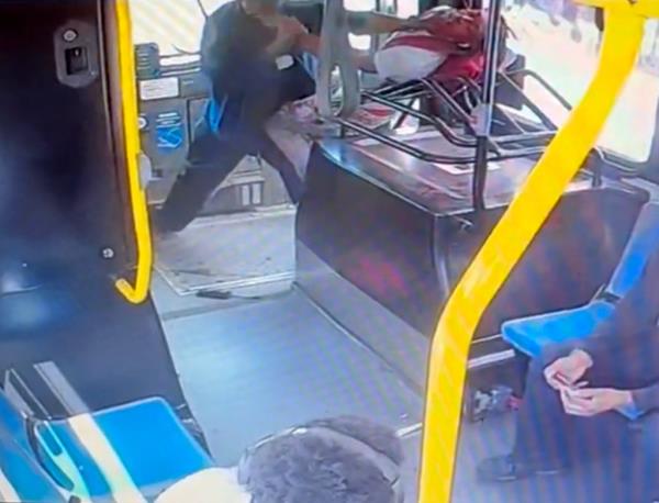 Surveillance footage shows driver Isaac Egharevba choking Houston during the altercation.