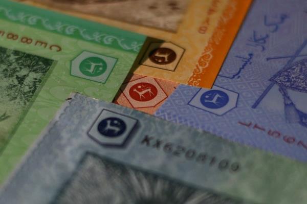 Ringgit ends lower against dollar ahead of US CPI data release