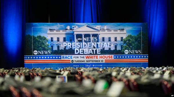 Signage is seen at the media filing center ahead of the presidential debate between Democratic presidential nominee Vice President Kamala Harris and Republican presidential candidate former President Donald Trump, in Philadelphia, Sept. 9, 2024.