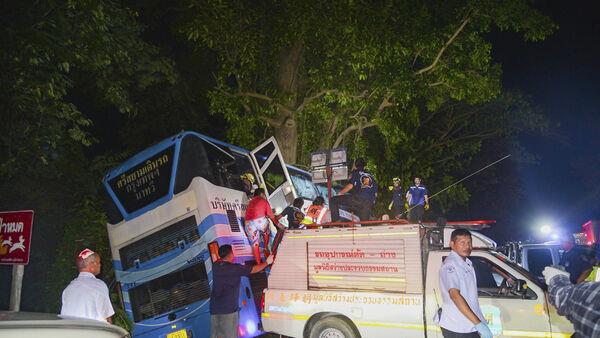 Fourteen dead and more than 30 injured after bus crashes in western Thailand