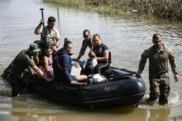 Rescues underway in flood-hit Greek towns as toll rises to 11