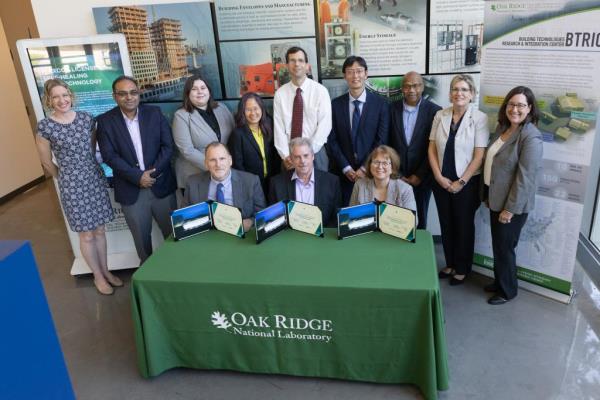 Flexcon Global gathered with ORNL to license two patented inventions