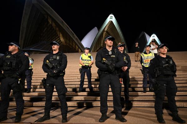 Police look on during a pro-Palestinian rally.