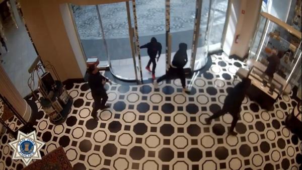 Footage shows the heist took less than a minute, according to store security footage.