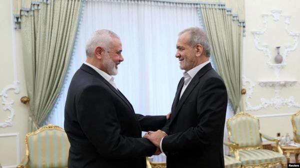 Iranian President Masoud Pezeshkian meets with Palestinian group Hamas' top leader, Ismail Haniyeh, in Tehran, Iran, July 30, 2024. Iran's Presidency /WANA (West Asia News Agency)/Handout via REUTERS