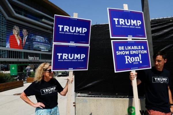 Trump seeks to upstage Republican rivals while skipping first debate