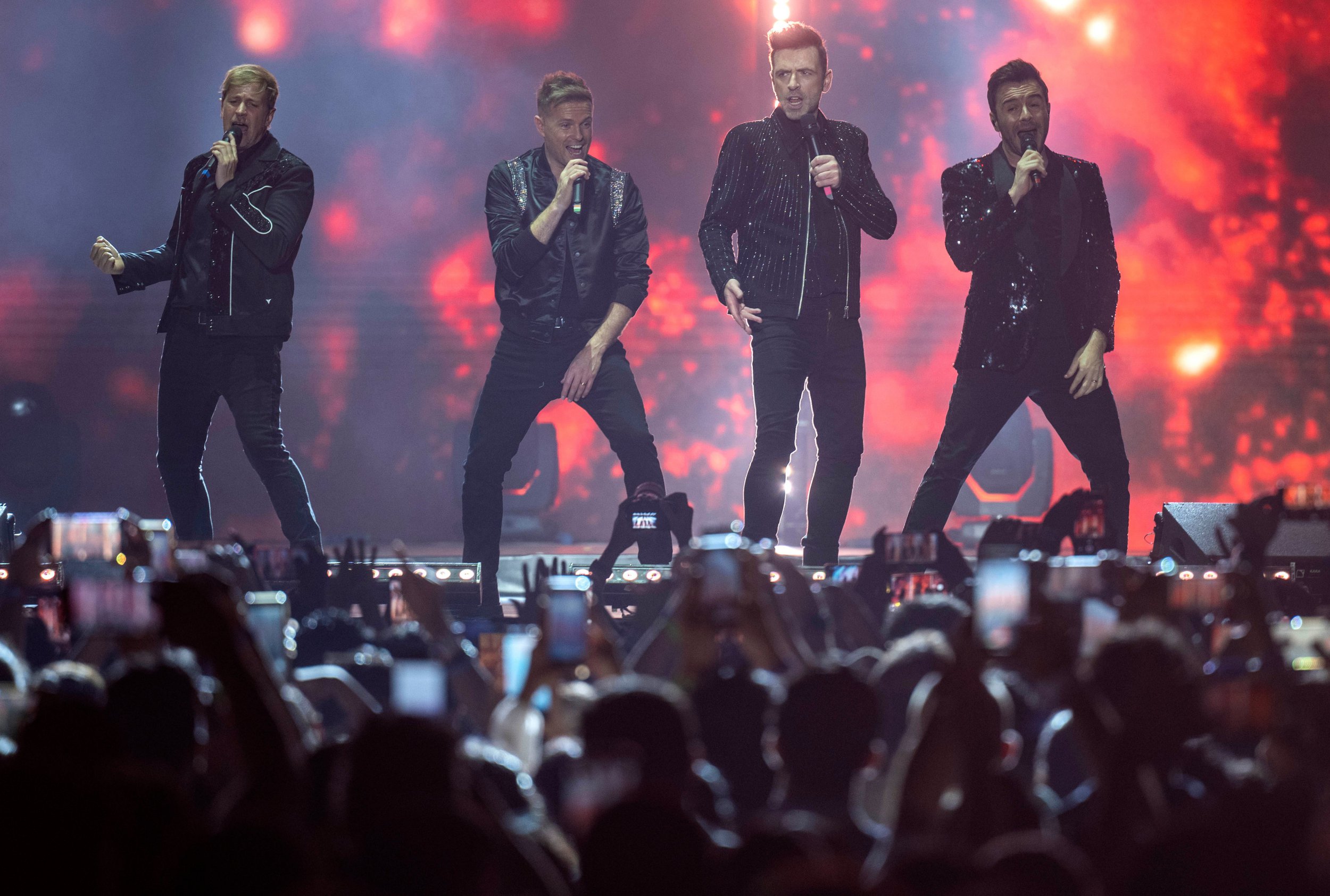 Westlife perform on stage