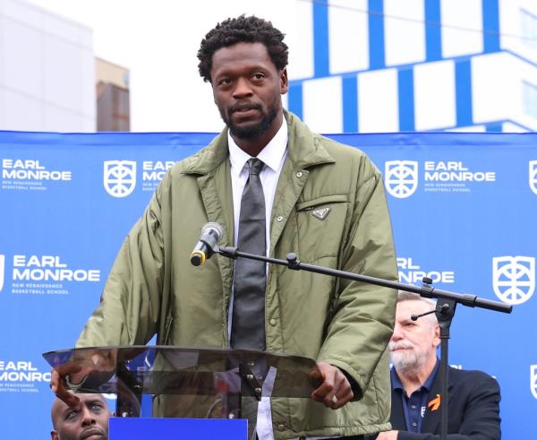 Julius Randle speaks during the ceremony at the Earl Monroe New Renaissance Basketball School.