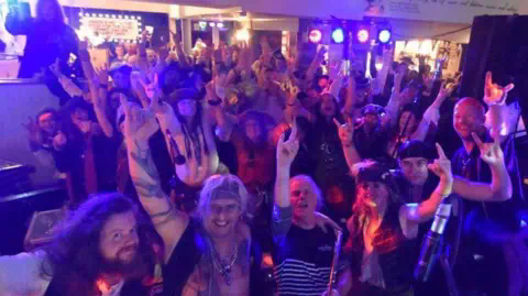 The Dolmen The Dolmen and their audience posing for the camera at their gig in Hardy's Hophouse pub